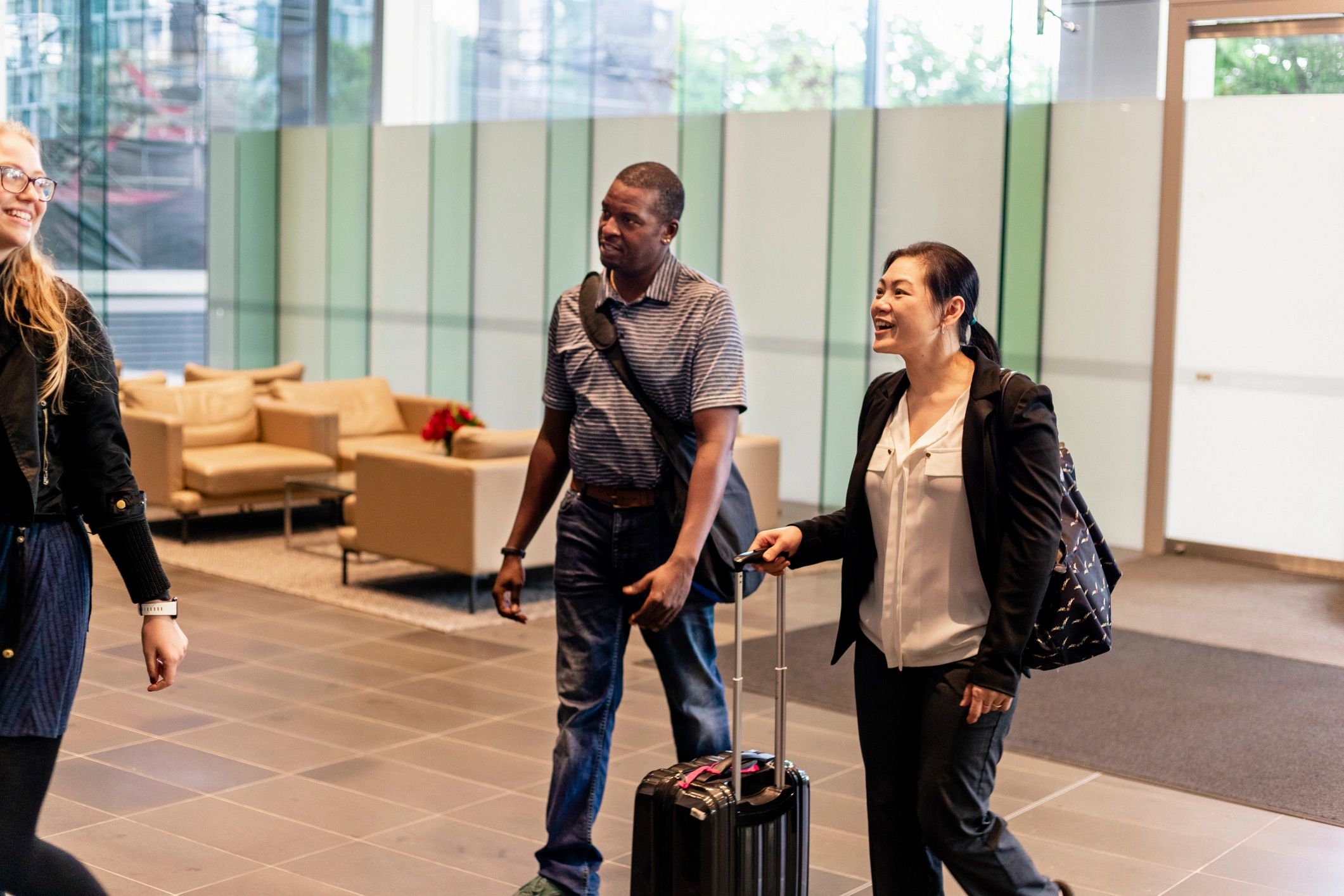 Business team preparing for a work trip with luggage